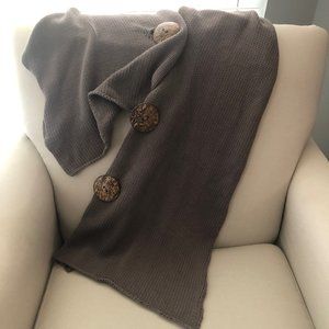 Knit shawl with button closure